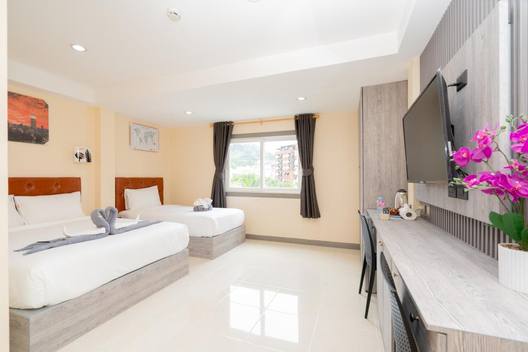 Square One Hotel Patong Экстерьер фото